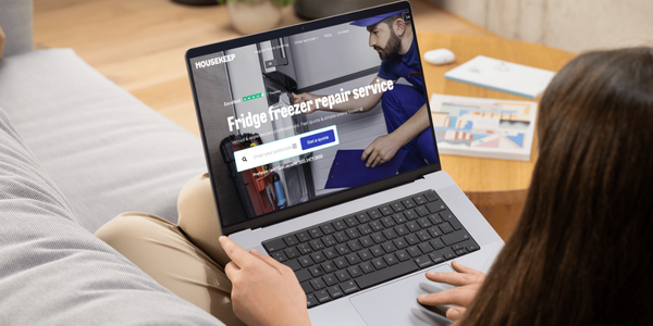 Woman booking a fridge freezer repair through the Housekeep website